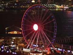 01C Honk Kong Observation ferris Wheel lit up at night from Sevva rooftop bar Hong Kong